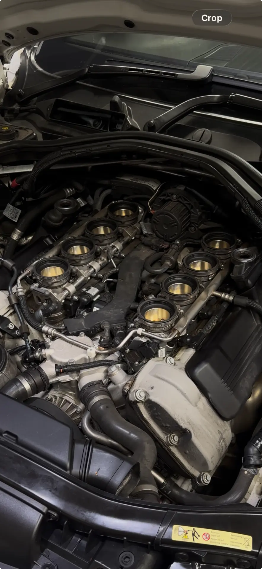 BMW V8 intake ports part-way through walnut blasting at Apex Wantirna South