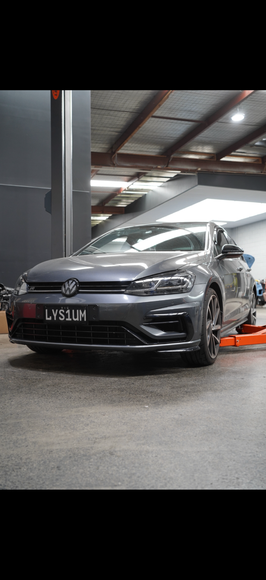 Grey VW Golf R in the Apex Melbourne workshop