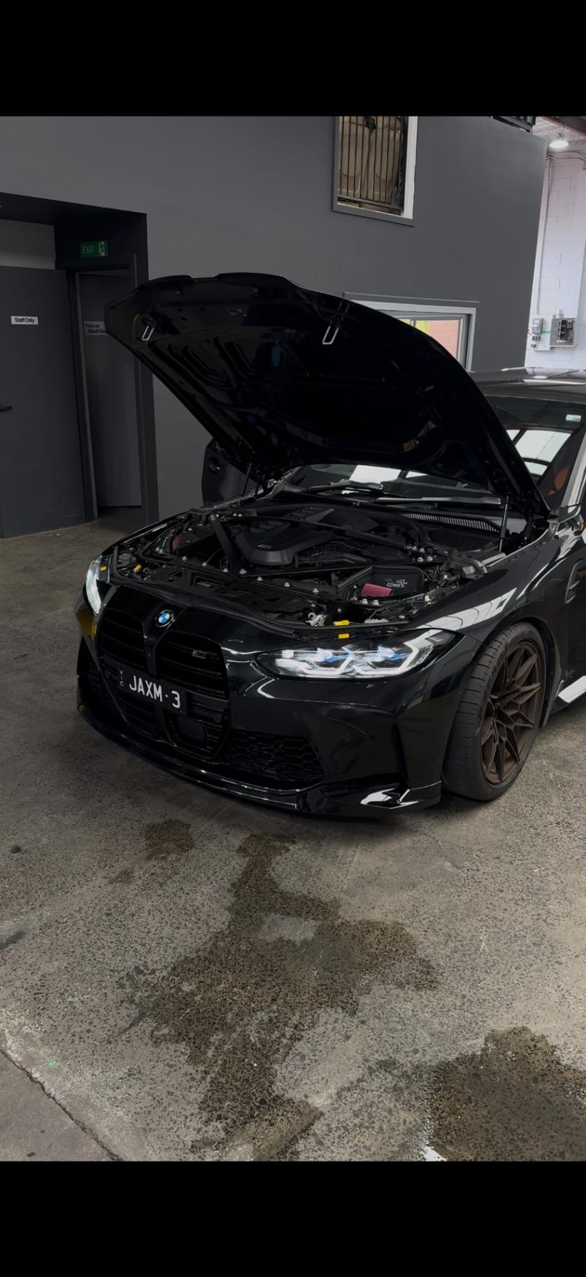 BMW G80 M3 with bonnet open for service at Apex Melbourne